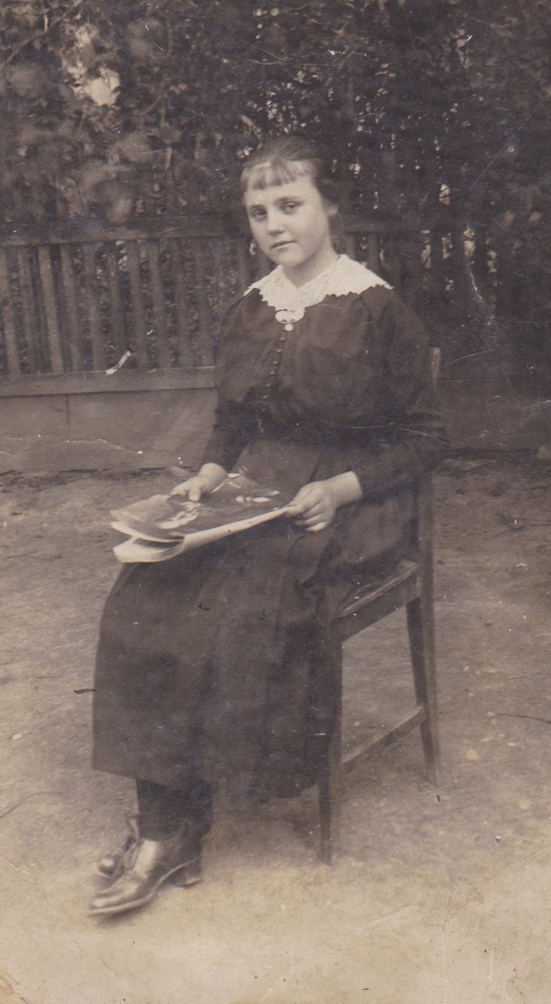 A teenager in 1917 or so reading a magazine