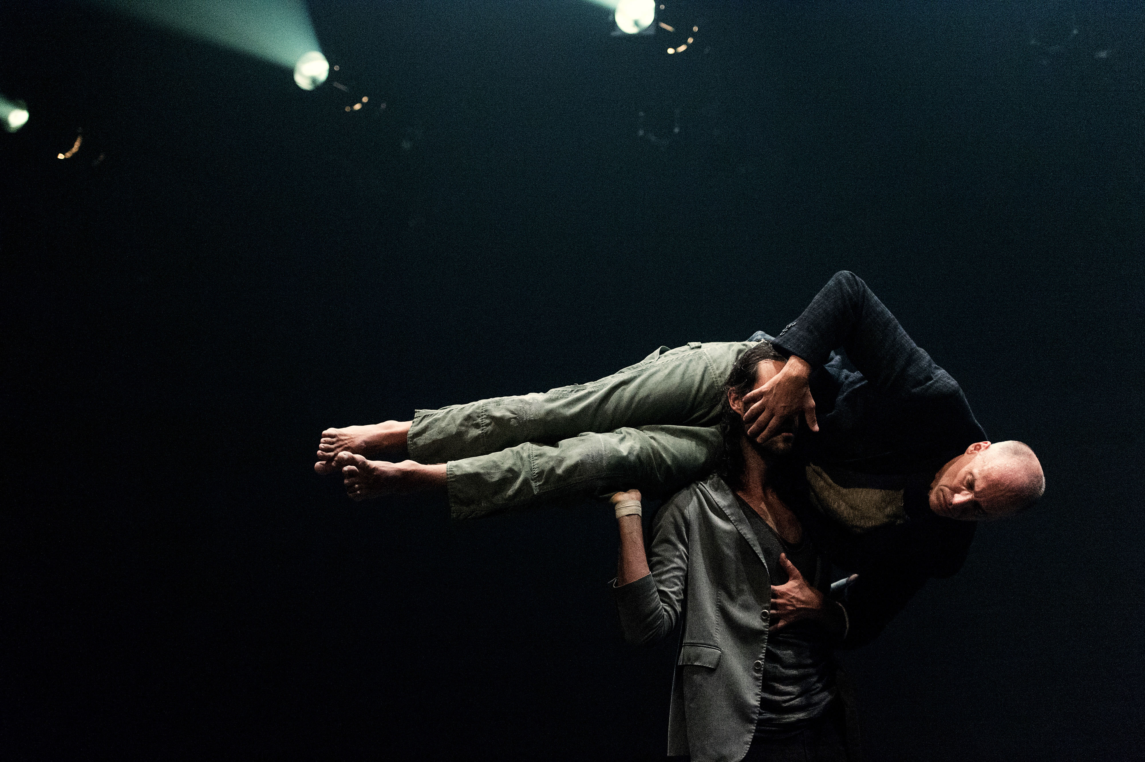 Two men in a contemporary dance piece called Dancers of Parts + Labour_Danse.